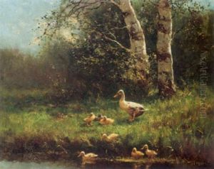 A Duck With Ducklings On A Riverbank