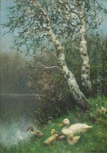 Duck And Ducklings On A Riverbank