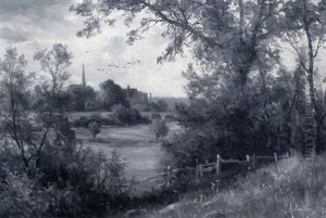 Overlooking Fields With A Town In The Distance