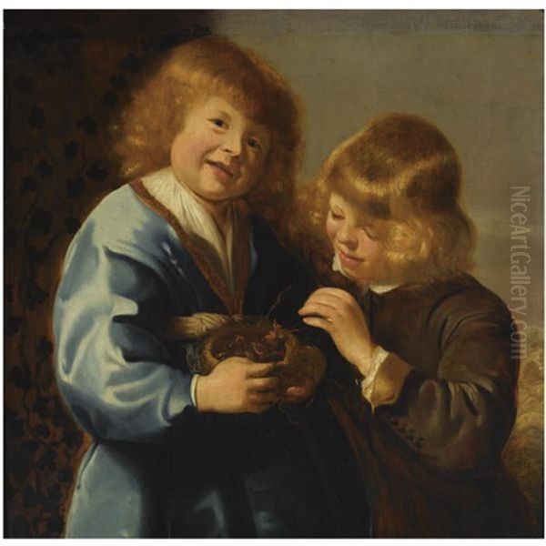 A Portrait Of Two Young Boys Holding A Bird's Nest - view 1