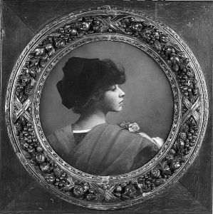 Head Of A Girl With Rose Corsage by Alfred Agache