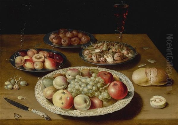 Still Life On A Plain Wooden Table: A Large Wan-li Porcelain Dish Of Fruit, A Pewter Dish Of Fruit, Medlars And Nuts, A Moth, Two Venetian-style Glasses Of Wine, One White And The Other Red, A Knife With An Ornamental Handle, White Grapes, A Roll Of Bread - view 1
