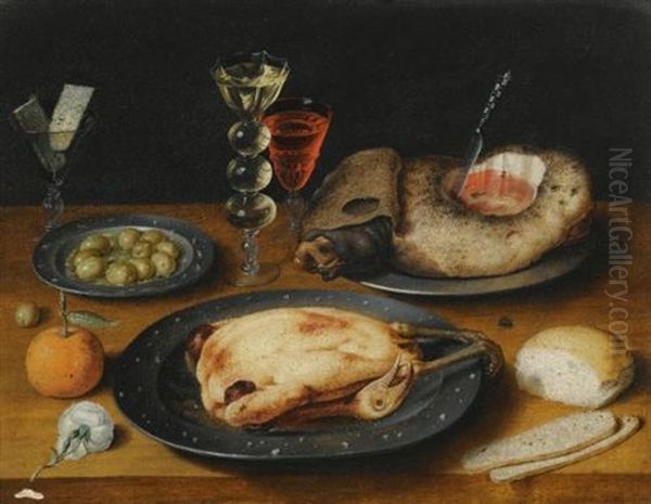 A Still Life Of A Roast Chicken, A Ham And Olives On Pewter Plates With A Bread Roll, An Orange, Wineglasses And A Rose On A Wooden Table (collab. W/studio) - view 1