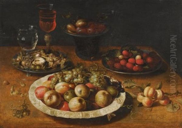 A Still Life Of Apples And Grapes In A Blue-and-white Porcelain Bowl, Raspberries And Walnuts In Pewter Dishes, Plums On A Pewter Dish Atop A Stand, Together With Three Wine-glasses And Sprigs Of Apricots And Gooseberries Upon A Wooden Table - view 1