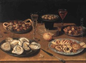 Oysters, Hazlenuts, Olives, Figs, A Glass Of Wine And A Knife On A Table