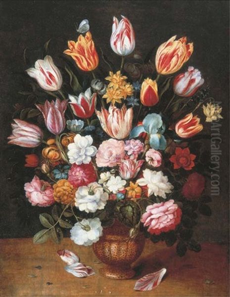 Tulips, Daffodils, Roses, An Iris And Other Flowers In A Pottery Vase On A Ledge - view 1