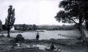 Figures In A River Landscape by Leon Le Goaebe De Bellee
