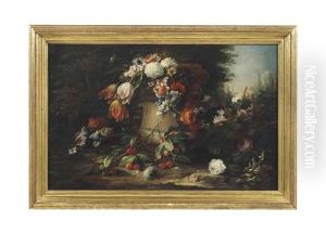 Flowers In A Stone Urn On A Garden Floor