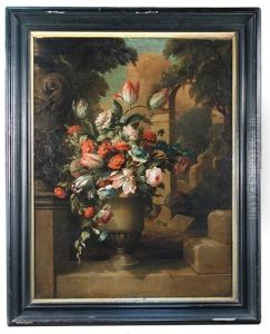 Still Life Of Pink And Red Tulips, Roses And Ranunculus In An Urn On A Stone Wall