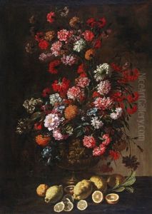 A Still Life Of Citrus Fruit And Flowers In An Elaborately Decorated And Gilded Vase