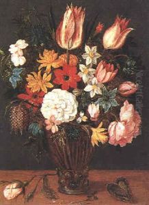 A Still Life Of Tulips, Roses, Anemones, Aquilegia, Love-in-the-mist, Rosemary, Narcissi, A Fritillary And Other Flowers In A Glass Vase Beside A Rose Stem On A Table by Pieter Binoit