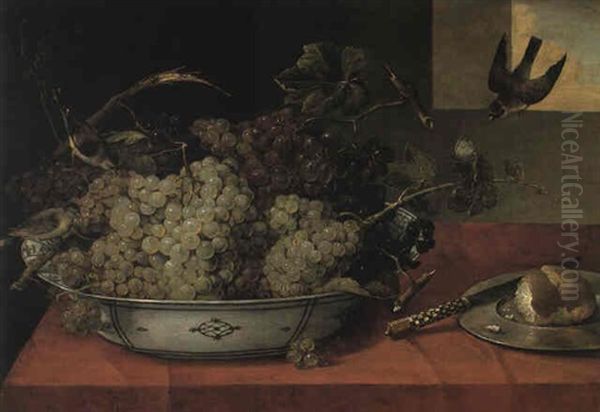 Bunches Of Grapes In A Bowl, Bread On A Plate And Finches On A Draped Table - view 1