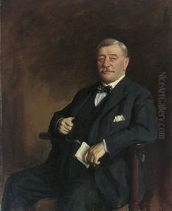 Portrait Of Sir John E. Mitchell In A Blue Suit And Bow-tie