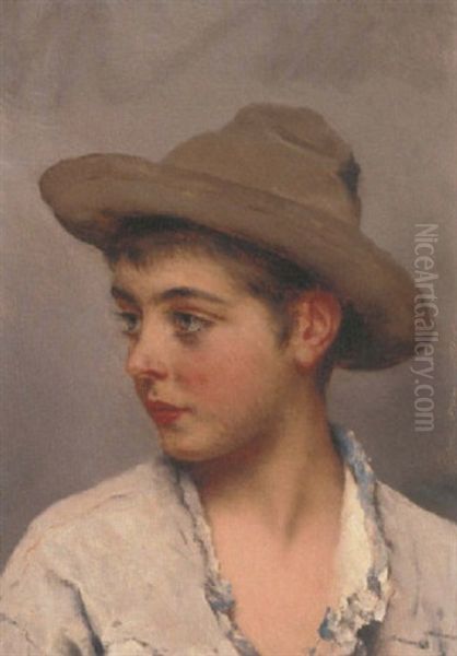 A Young Boy Wearing A Stetson - view 1