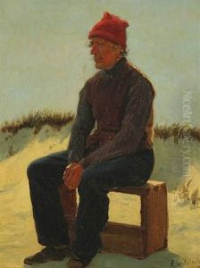 A Seated Man On A Box In The Dunes