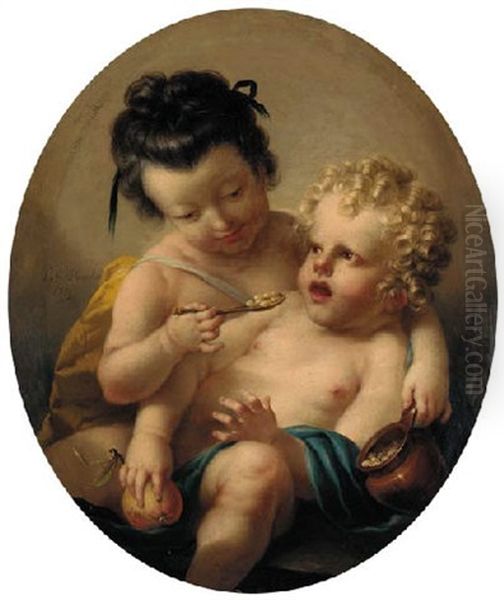 A Young Girl Feeding Another Child - view 1
