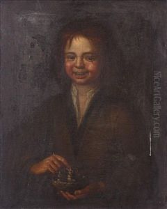 Portrait Of A Young Boy Holding A Bird's Nest