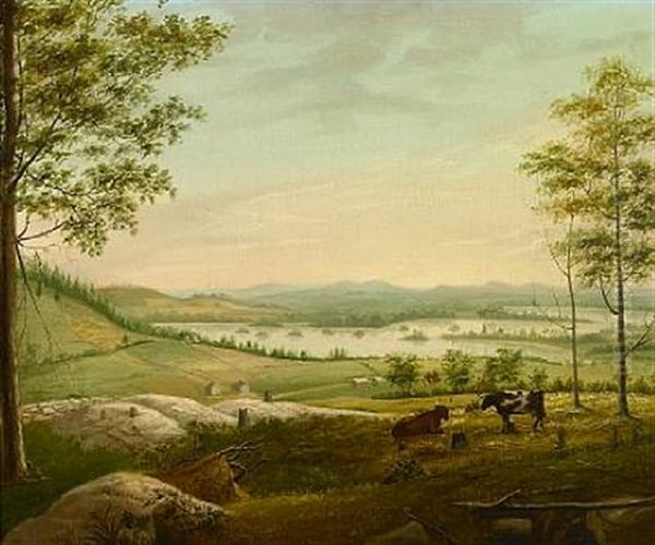 Cows Grazing On A Hillside With A View Of A Lake And Farmhouse - view 1