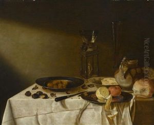 Still Life With Roemer, Pitcher, Nuts And Fruit On Pewter Platters by Maerten Boelema De Stomme