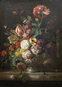 Roses, Tulips, Marigolds And Other Flowers In A Silver Vase On A Marble Ledge