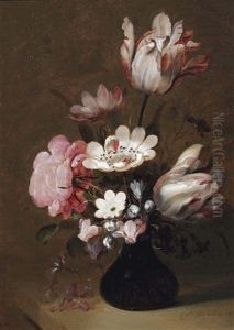 A Glass Vase With Tulips, Peonies And Other Flowers On A Stone Ledge by Hans Bollongier