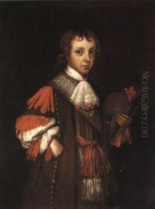 Portrait Of A Young Boy Holding A Hat
