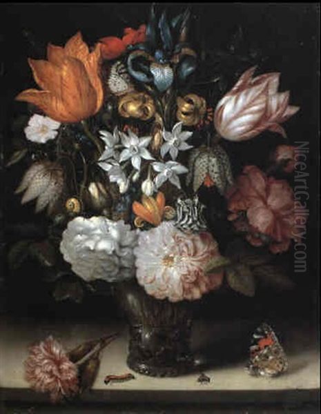 Tulips And Other Flowers In A Glass Vase On A Ledge - view 1