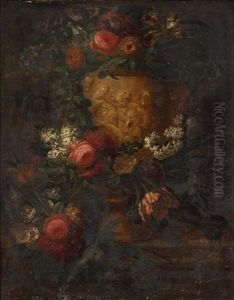 Mixed Flowers In A Sculpted Stone Urn Upon A Ledge