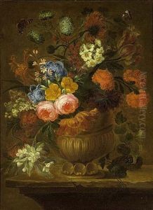 A Still Life With Cabbage Roses, Peonies, An Opium Poppy, Tulips, Snow Balls, Marigold And Other Flowers In A Sculpted Vase On A Wooden Table, Together With Butterflies