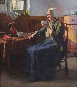 Koffiedrinkende Vrouw Aan Tafel Koffiedrinkende Vrouw Aan Tafel