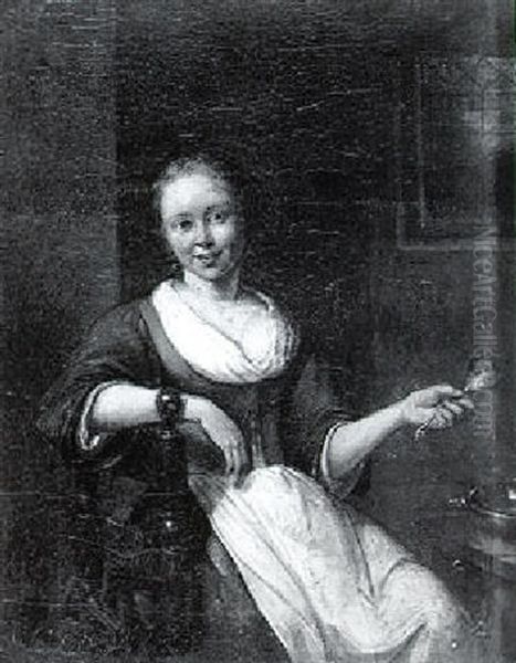 Young Woman Seated At A Table Holding A Spoon - view 1