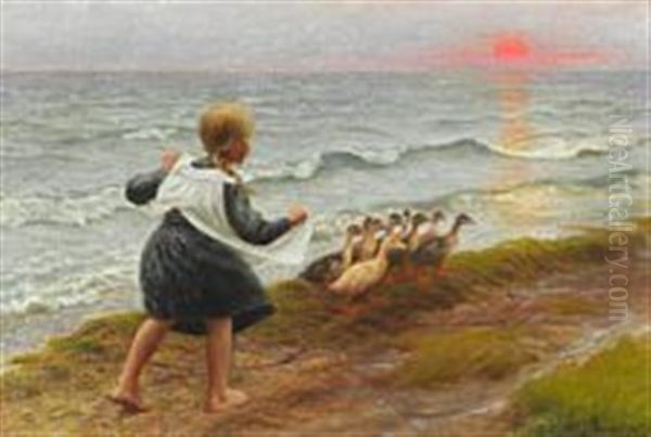 A Little Girl Chasing Ducks On The Beach At Sunset - view 1