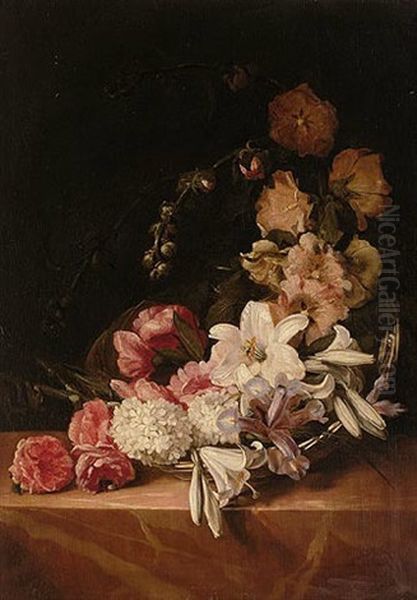 A Basket Of Summer Flowers Including Roses, Lilies, Hollyhocks And Irises On A Pink Marble Ledge - view 1