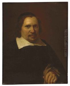 Portrait Of A Man Holding Gloves
