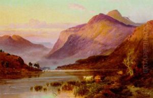 Highland Cattle Watering In A Loch Landscape