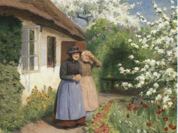 To Bondekoner Staende I Solskin Ved Et Strataekt Bondehus Omgivet Blomster Og Blomstrende Frugttraeer - view 1