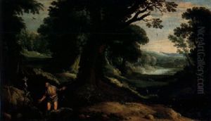 A Wooded Landscape With A Hermit Saint Kneeling Before A Crucifix