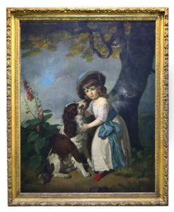 A Small Child With A Liver And White Spaniel In A Landscape