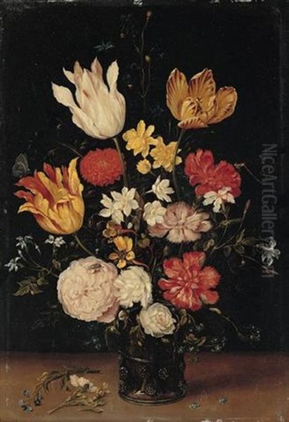A Still Life Of Tulips, Roses, Carnations And Other Flowers In A Glass Vase - view 1