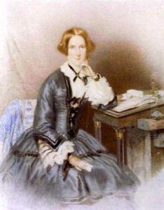 Portrait Of A Lady Seated At A Davenport Desk Portrait Of A Lady Seated At A Davenport Desk