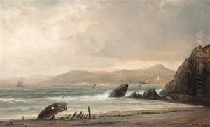 A Rocky Coast With A Lighthouse In The Distance by Norton Bush