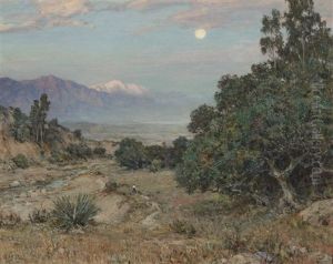 Early Moon Rise With Mountains In The Distance