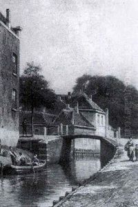 A View Of The South Wall Of The Hague With Figures Unloading Boat by Jacques Francois Carabain