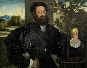 Portrait Of A Gentleman, Half-length, Standing Before A Lemon Tree And Holding A Lemon by Giovanni Cariani
