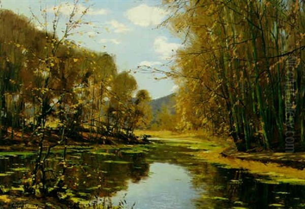 An Autumnal Landscape With A Lake In The Foreground - view 1