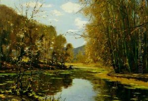 An Autumnal Landscape With A Lake In The Foreground by Louis Caron