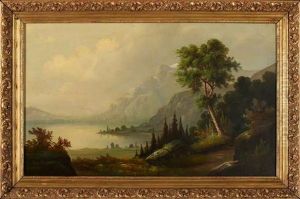 View Of A Lakeside Path With Mountains In The Distance