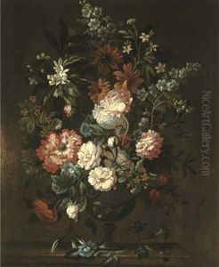 Peonies, Convolvulus, Carnations, Rosebuds And Other Flowers In A Glass Vase On A Stone Ledge