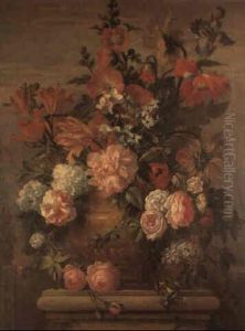 Roses, Peonies And Other Flowers In An Urn Resting On A Stone Ledge