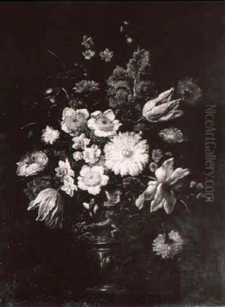 Tulips, Daffodills, Carnations And Other Flowers In A Sculpted Urn On A Ledge - view 1